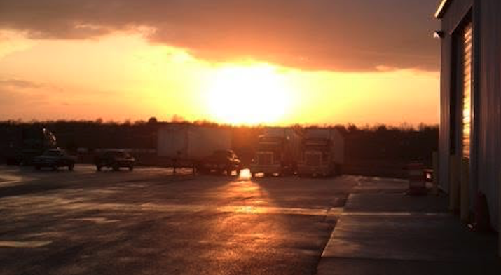Sun setting over the parking lot at Walters Truck and Trailer in Georgetown, KY